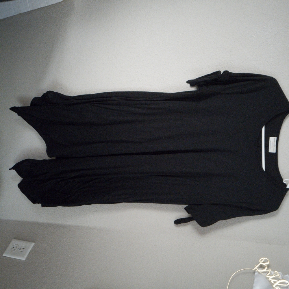 Black asymmetrical dress with pockets